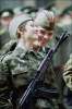 two laughing girls in the military